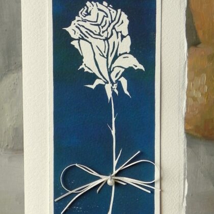 Graphic-colored linocut. 