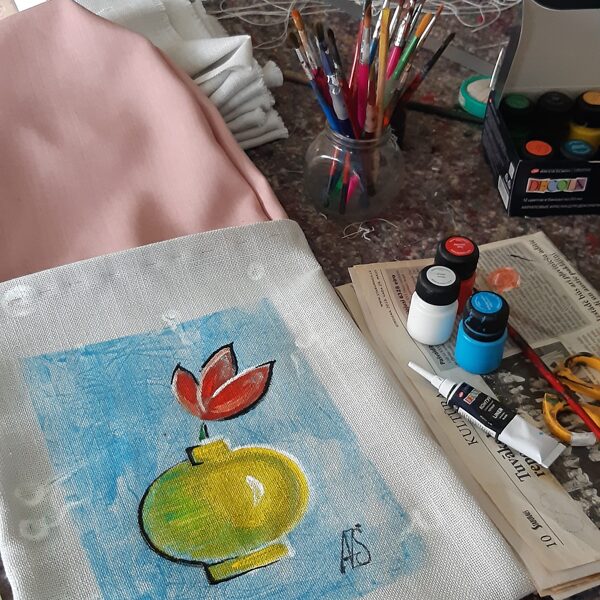 I hand painted a small picture with fabric paints.