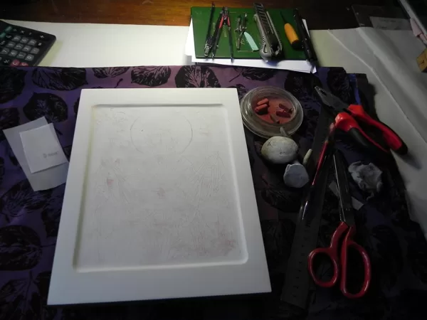 the sketch is transferred to the board