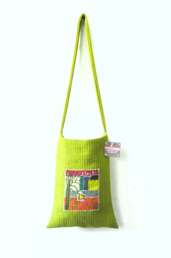 Green bag. Available for purchase at ANNA'S ART SPACE. 
