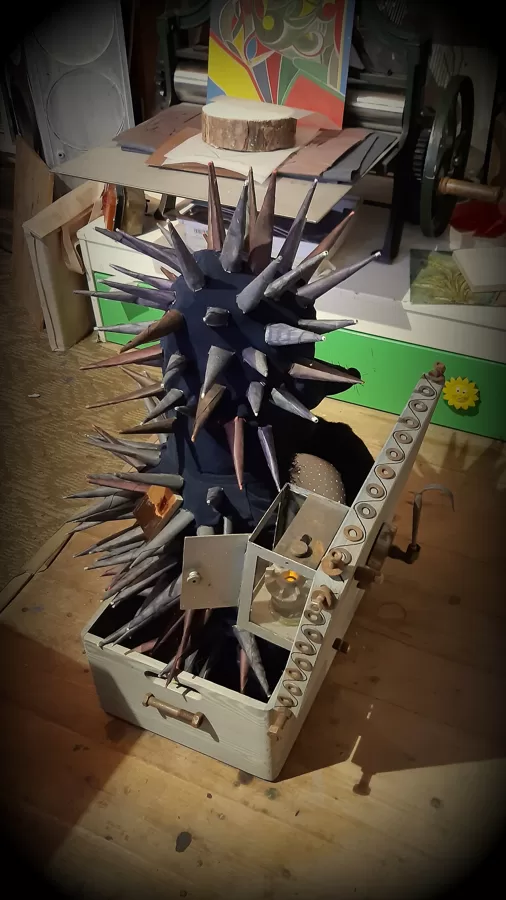 "Hedgehog in a box". Fabric, cardboard, tinted paper, wood, iron. 2015-2022.