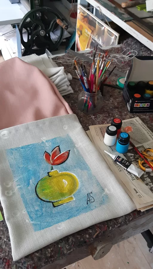 I hand painted a small picture with fabric paints.